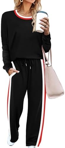 A solid black two-piece set cut in a smooth stretch knit, finished with clean side stripes and practical pockets.