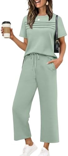 A soft sage green set paired with wide-leg cropped bottoms and side-slit details for breezy warm-weather travel.