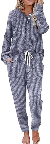 Deep dark blue knit sets an easy tone for this two-piece lounge outfit cut with a buttoned v-neck top and drawstring pants.
