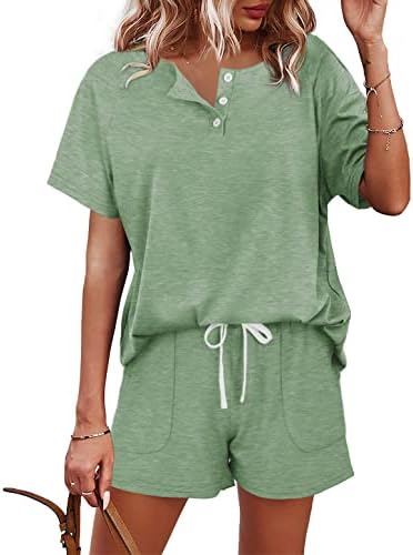 A cool light green knit set pairing a henley button top with pocketed drawstring shorts for relaxed summer mornings.