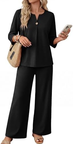 Deep black knit gives this two-piece pairing a clean line from the notched neckline down through the wide-leg hem.