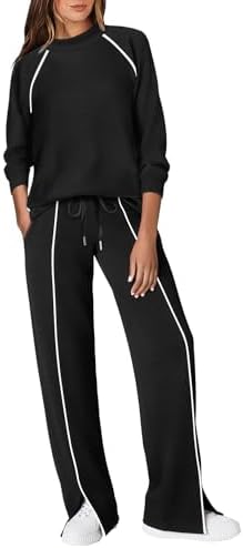 Clean contrast piping sets off deep solid black on this lightweight two-piece track set built with easy side-slit bottoms.