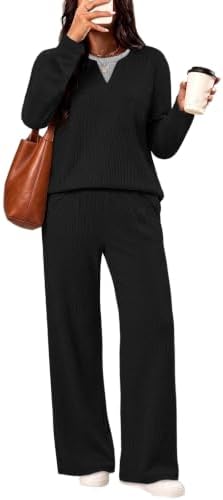 Deep black textured knit shapes this relaxed two-piece set, combining an easy v-neck top with fluid wide-leg pants.