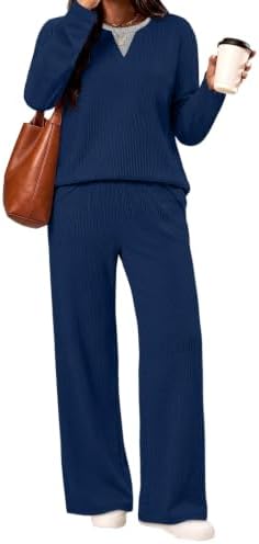 A deep navy two-piece set cut with a long sleeve V-neck top and easy wide-leg pants in a lightweight textured knit.