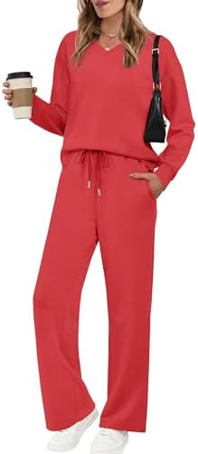 A bold red two-piece set pairs a relaxed V-neck top with wide-leg pants for easy travel days and laid-back weekends.