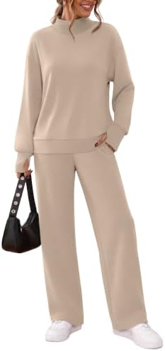 A soft mock neck top with thumb holes pairs with wide-leg drawstring pants in a quiet, warm khaki tone.