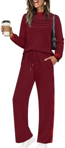 Drapey spacer knit shapes this red plaid two-piece set, cut with side slits on the long sleeve top and wide cropped pants.