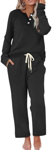 A solid black henley top and wide leg pants combine for relaxed lounge days or quick afternoon errands around town.