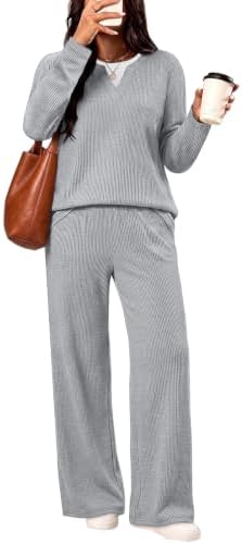 A textured two-piece set in grey with a long sleeve V-neck top and wide-leg pants cut for easy travel days.
