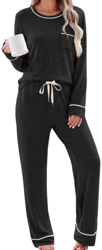Crisp contrast piping outlines this jet black two-piece set, pairing a pocketed crewneck top with relaxed wide leg lounge pants.