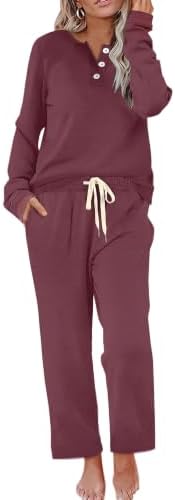 Spun from a soft stretch knit, this purple two-piece set pairs a buttoned henley top with breezy wide leg lounge pants.