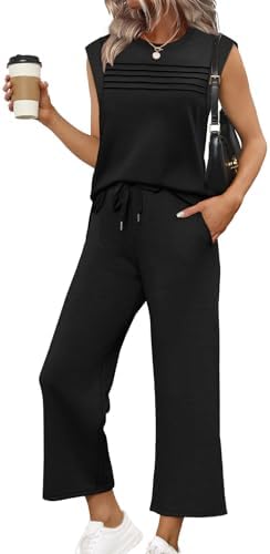 Cut from drapey four-way stretch spacer fabric, this black cap-sleeve top and wide-leg cropped pant set packs easily for warm trips.