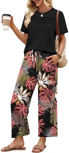 Soft knit separates pair a pleated short-sleeve top with cropped wide-leg pants in our bold black pink leaf tropical print.