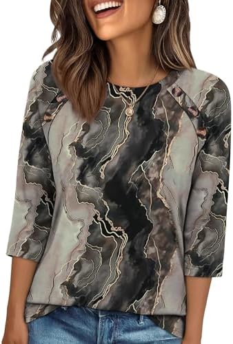A soft tie dye pattern gives this three-quarter sleeve top an easy, artistic look with tidy button accents.