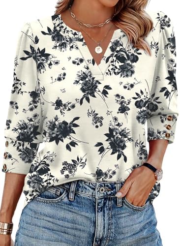 A crisp black ground with bright floral work gives this three-quarter sleeve top an easy transition between work and weekend wear.