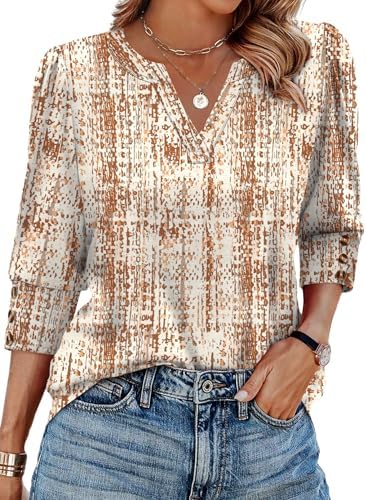 Earthy brown print covers this breezy top, finished with subtle puff shoulders and tidy buttoned cuffs.