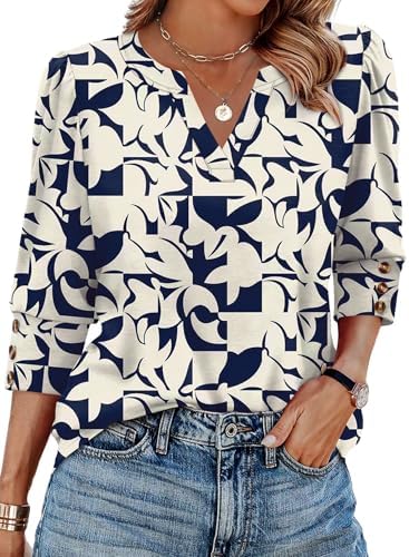 Three-quarter sleeves with button cuffs and a curved hem give this navy print top an easy shape for warm days.