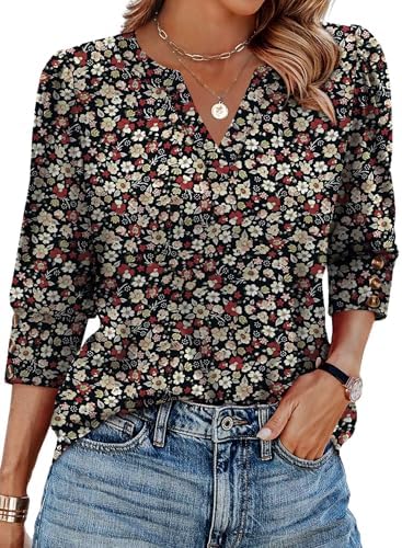 Subtle puff shoulders and neat triple-button cuffs give this soft three-quarter sleeve top an easy, polished line.