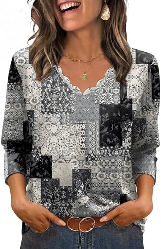 A softly scalloped neckline and three-quarter sleeves define this lightweight top in an earthy boho charcoal grey print.