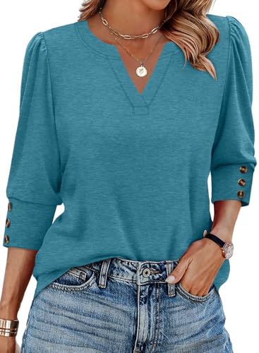 Subtle puff shoulders and three-button cuffs frame this bright turquoise blouse, cut in a soft knit with a classic V-neckline.