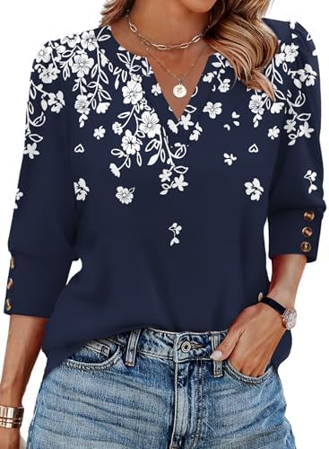 A crisp navy backdrop with bright white botanical blossoms sets off this three-quarter sleeve blouse with triple-button cuffs.