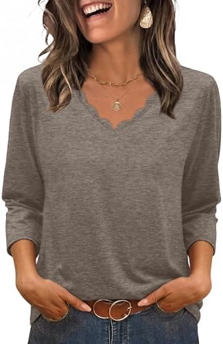 A softly scalloped V-neckline leads into three-quarter sleeves in rich coffee brown, finished with a gentle curved hemline.