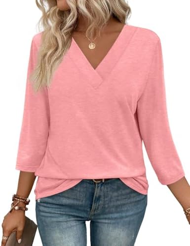 A vivid coral tunic cut loose through the body with three-quarter sleeves and a clean V-neck for warm days.