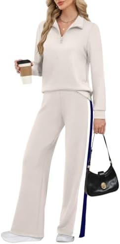 Spun from lightweight spacer knit, this grey khaki two-piece set pairs a half-zip pullover with relaxed wide-leg pants.
