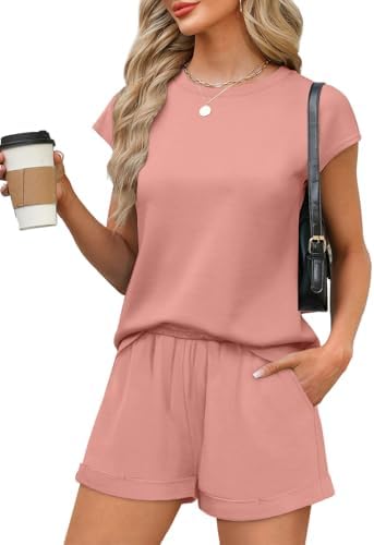 Woven in a cheerful coral pink, this two-piece set pairs a cap-sleeve crewneck top with elastic-waist shorts for easy warm-weather travel.