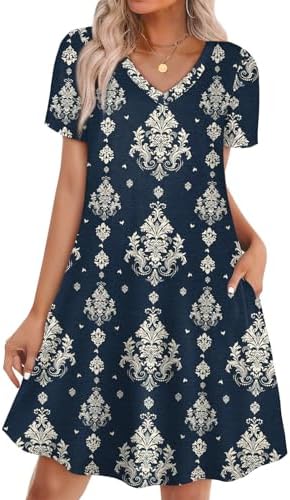 An intricate navy ethnic print anchors this airy V-neck tshirt dress, cut loose with roomy side pockets.