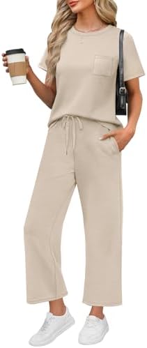 A relaxed beige spacer knit set pairs a classic crewneck tee with cropped wide-leg pants for easy travel days.