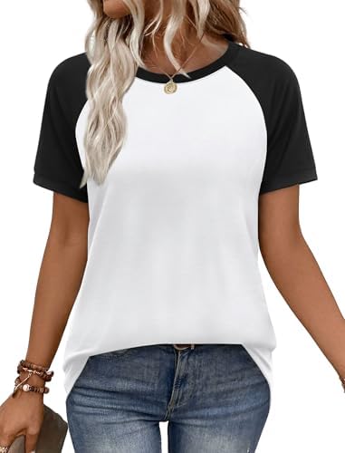 Crisp black raglan sleeves set against a clean white body give this soft knit tee a sharp, athletic contrast.