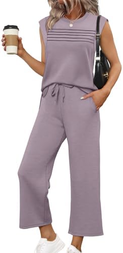 A vivid purple lounge set cut from airy spacer knit with cap sleeves, front pleats, and wide cropped pants.