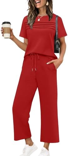 A vibrant red two-piece set cut from breezy four-way stretch spacer fabric, pairing a pleated top with cropped wide-leg pants.
