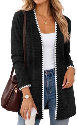Lightweight black knit pairs with delicate contrast scallop edging along the open front to sharpen everyday outfits.