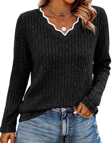 A velvety soft black knit with a clean scalloped neckline gives this long sleeve top an easy, neat look for work or weekends.