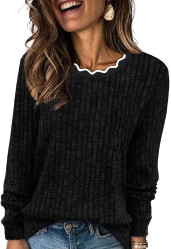 A plush scalloped neckline top in solid black that pairs easily with tailored work pants or relaxed denim.