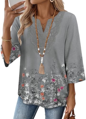A muted grey ground softens the botanical print across this breezy three-quarter sleeve blouse with delicate front lace.