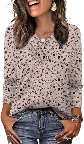 Tiny scattered blooms across a soft knit make this v-neck tunic an easy pick for crisp mornings and travel days.