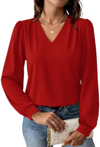 A rich red knit cut with shoulder pleats, a clean V-neckline, and subtle puff sleeves for easy workdays and dinner plans.