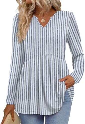 Crisp blue stripes meet a generous babydoll shape and soft puff sleeves for a breezy tunic cut that layers with ease.