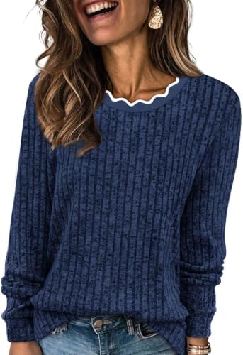 A soft blue knit sweater cut with an eye-catching scalloped neckline, tailored for easy pairing across seasons.
