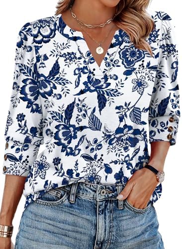 Gathered shoulders and triple-button cuffs bring clean structure to this soft, hip-skimming 3/4-sleeve top.