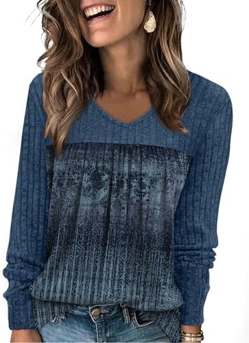 Gentle blue ombre shading meets a fine vertical rib in this soft long sleeve top, cut with front pleats and a classic V-neck.
