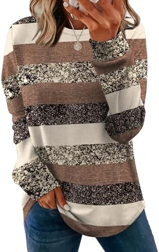 Horizontal bands break up the clean profile of this curved-hem tunic, cut long enough to pair easily with slim bottoms.