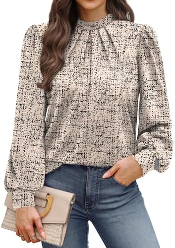 Subtle shoulder pleats and a mock neck define this beige and black blouse, tailored in a lightweight stretch knit for cooler days.