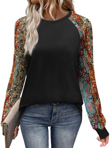 Black boho print sleeves frame a solid body on this soft raglan top, cut relaxed for easy layering on crisp fall mornings.