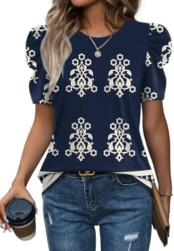 Puffed leg-of-mutton sleeves add easy volume to this navy blue boho print top, cut in a soft, breathable summer knit.