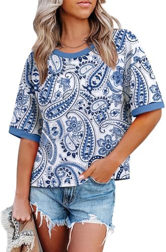 Ethnic blue patterning meets contrast color-block bands on this loose half-sleeve top cut for warm-weather packing.