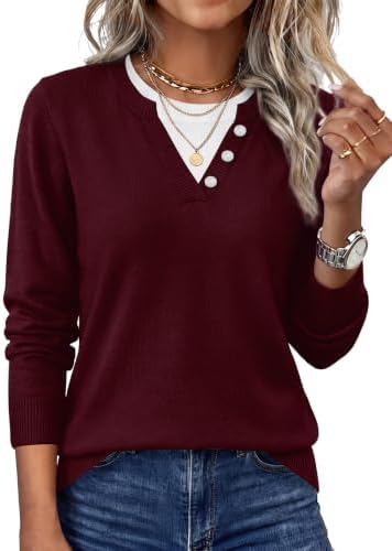 A deep wine knit finished with a contrast collar and decorative button placket creates a clean two-in-one layered effect.